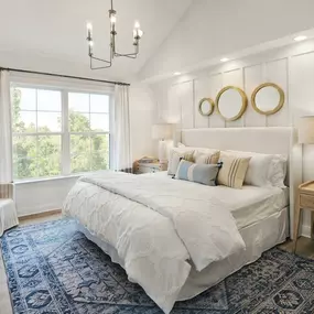 Spacious primary bedroom suites offer luxurious baths and impressive closet spaces