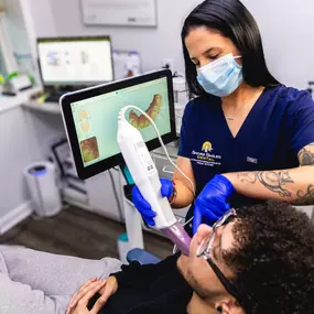 Shore Smiles Dental staff and patient