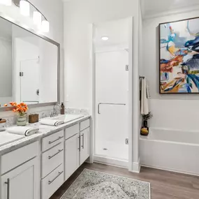 Separate Soaking Tub & a Standalone Frameless Glass-Enclosed Shower In Each Home