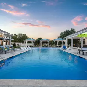 Resort-Inspired Swimming Pool with Soaking & Tanning Ledges, Covered Pavilion, & Cabanas