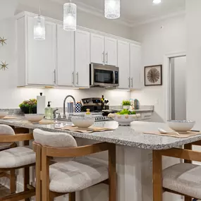 Elegant Luna Pearl Granite Countertops with Expansive Entertainment Island