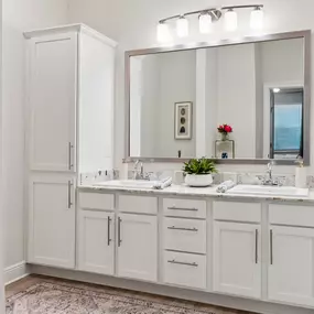Oversized Bathroom with a Double-Sink Vanity & Designer Lighting