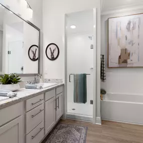 Separate Soaking Tub & a Standalone Frameless Glass-Enclosed Shower In Each Home