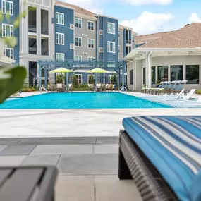 Resort-Style Swimming Pool Featuring Soaking & Tanning Ledges with Sunken Ledge Loungers
