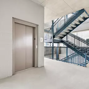 Four-Story Direct-Access Parking Garage with Elevator