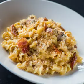 [Mac + Cheese]² - With white truffle, bacon, chicken, crimini, shiitake & oyster mushrooms, parmesan and panko cheddar crust.