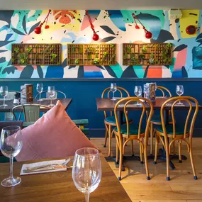 Zizzi Cambridge Regent St, lively mural backdrop with stylish seating