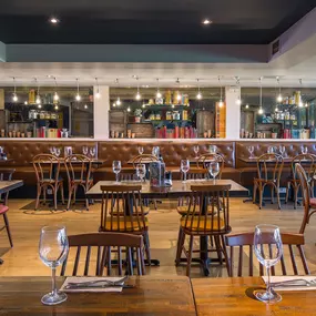 Zizzi Cambridge Regent St, bright dining space with colourful accents.