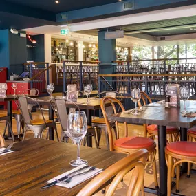 Zizzi Cambridge Regent St, bright dining space with colourful accents.