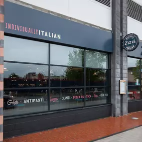 Exterior view of Zizzi Bexleyheath restaurant with inviting entrance.