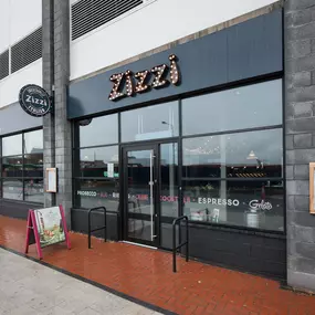 Exterior view of Zizzi Bexleyheath restaurant with inviting entrance.