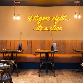 Stylish dining area at Zizzi St Andrews with vibrant colours, modern decor and natural accents.