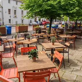 Exterior view of Zizzi St Andrews entrance and outside dining area.