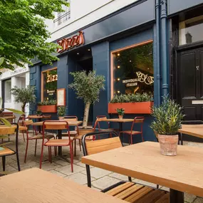 Exterior view of Zizzi St Andrews entrance and outside dining area.