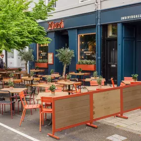 Exterior view of Zizzi St Andrews entrance and outside dining area.