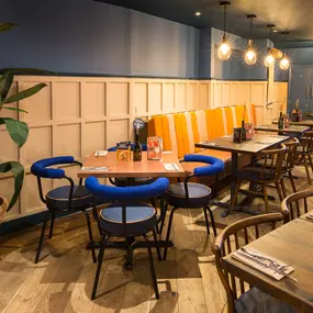 Warm Zizzi Stratford-upon-Avon interior mixing rustic charm and modern flair.