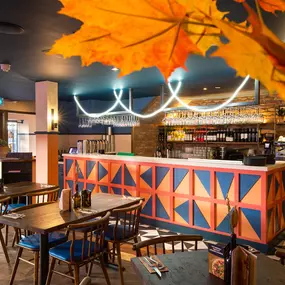Warm Zizzi Stratford-upon-Avon interior mixing rustic charm and modern flair.