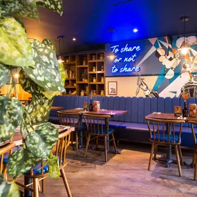 Warm Zizzi Stratford-upon-Avon interior mixing rustic charm and modern flair.