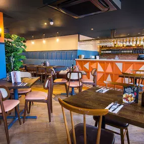 Warm Zizzi Stratford-upon-Avon interior mixing rustic charm and modern flair.