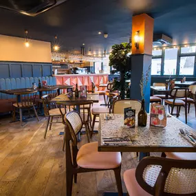 Warm Zizzi Stratford-upon-Avon interior mixing rustic charm and modern flair.