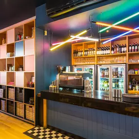Stylish dining area at Zizzi South Woodford with modern decor and natural accents.
