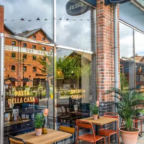 Zizzi Gloucester Quays, inviting outdoor seating along the Quays’ riverside walk.