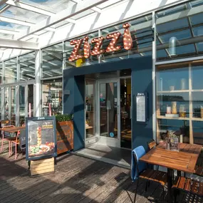 Cardiff Mermaid Quay, waterfront tables with panoramic bay views.