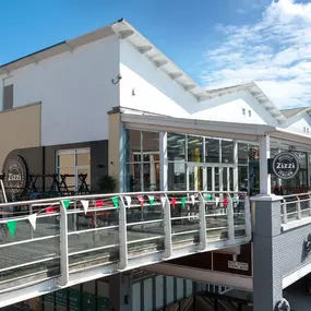 Cardiff Mermaid Quay, waterfront tables with panoramic bay views.