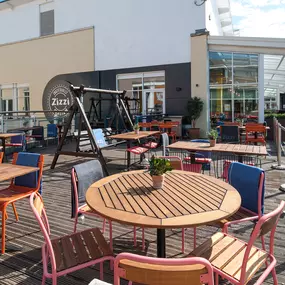 Cardiff Mermaid Quay, waterfront tables with panoramic bay views.
