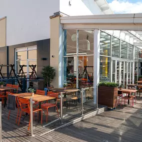 Cardiff Mermaid Quay, waterfront tables with panoramic bay views.