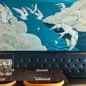 Stylish nautical-themed Zizzi Port Solent interior with warm lighting and wood finishes.