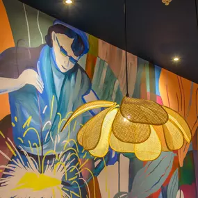 Interior view of Zizzi Sheffield Meadowhall's vibrant modern dining area at with rustic decor and natural accents.