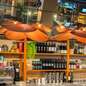 Interior view of Zizzi Sheffield Leopold Square's modern decor and rustic style accents.