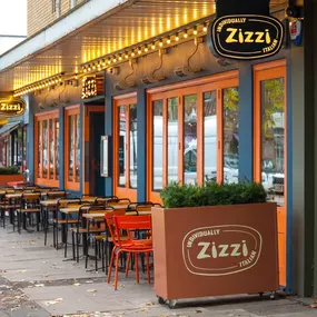 Zizzi Chiswick showcasing the inviting outdoor seating area and restaurant front.