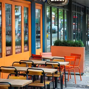 Zizzi Chiswick showcasing the inviting outdoor seating area and restaurant front.