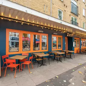 Zizzi Chiswick showcasing the inviting outdoor seating area and restaurant front.