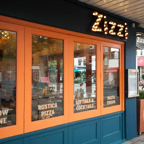Zizzi Chiswick showcasing the inviting outdoor seating area and restaurant front.