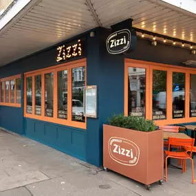 Zizzi Chiswick showcasing the inviting outdoor seating area and restaurant front.