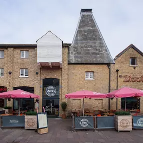 Zizzi Chelmsford, outdoor dining under umbrellas.