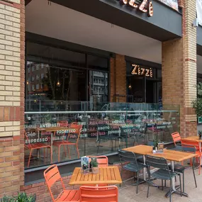 Zizzi Coventry, modern restaurant front with outdoor dining.
