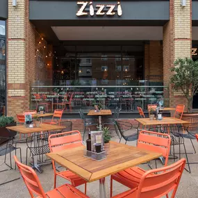 Zizzi Coventry, modern restaurant front with outdoor dining.