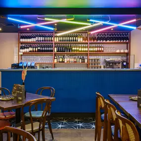 Contemporary dining interior at Zizzi The Strand (West End) with creative design and warm atmosphere.