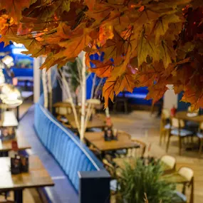 Contemporary dining interior at Zizzi The Strand (West End) with creative design and warm atmosphere.