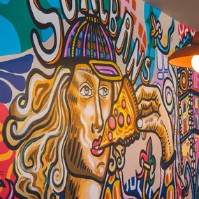 Stylish dining area at Zizzi St Albans with modern decor and natural accents.