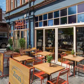 Street view of the Zizzi St Albans restaurant entrance and front of restaurant dining area.