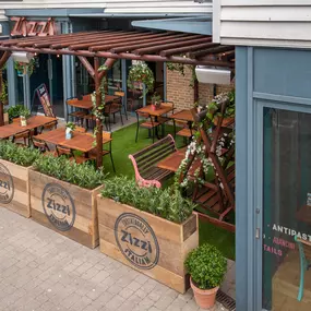 Seaside Zizzi Whitstable exterior with nautical charm and welcoming  entrance featuring outdoor dining area