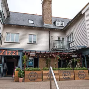Seaside Zizzi Whitstable exterior with nautical charm and welcoming  entrance featuring outdoor dining area