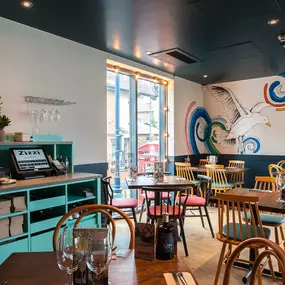 Zizzi Whitstable, coastal inspired interior with rustic and modern details.