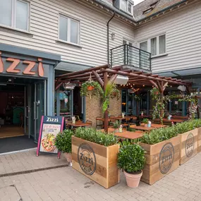 Seaside Zizzi Whitstable exterior with nautical charm and welcoming  entrance featuring outdoor dining area