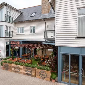 Seaside Zizzi Whitstable exterior with nautical charm and welcoming  entrance featuring outdoor dining area